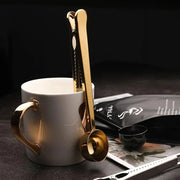 Colher para Café com Presilha Inox Prendedor de Embalagem Colher para Café com Presilha Inox Prendedor de Embalagem Bellaffina Dourado 